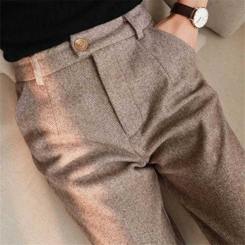Close-up of brown tweed pants with a blurred background