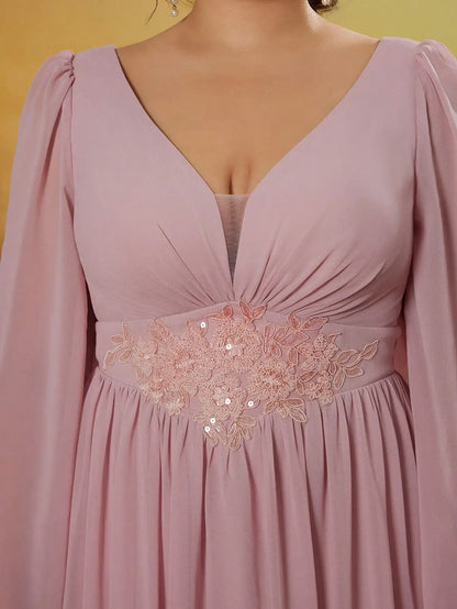 Pink dress with floral embroidery on a yellow background