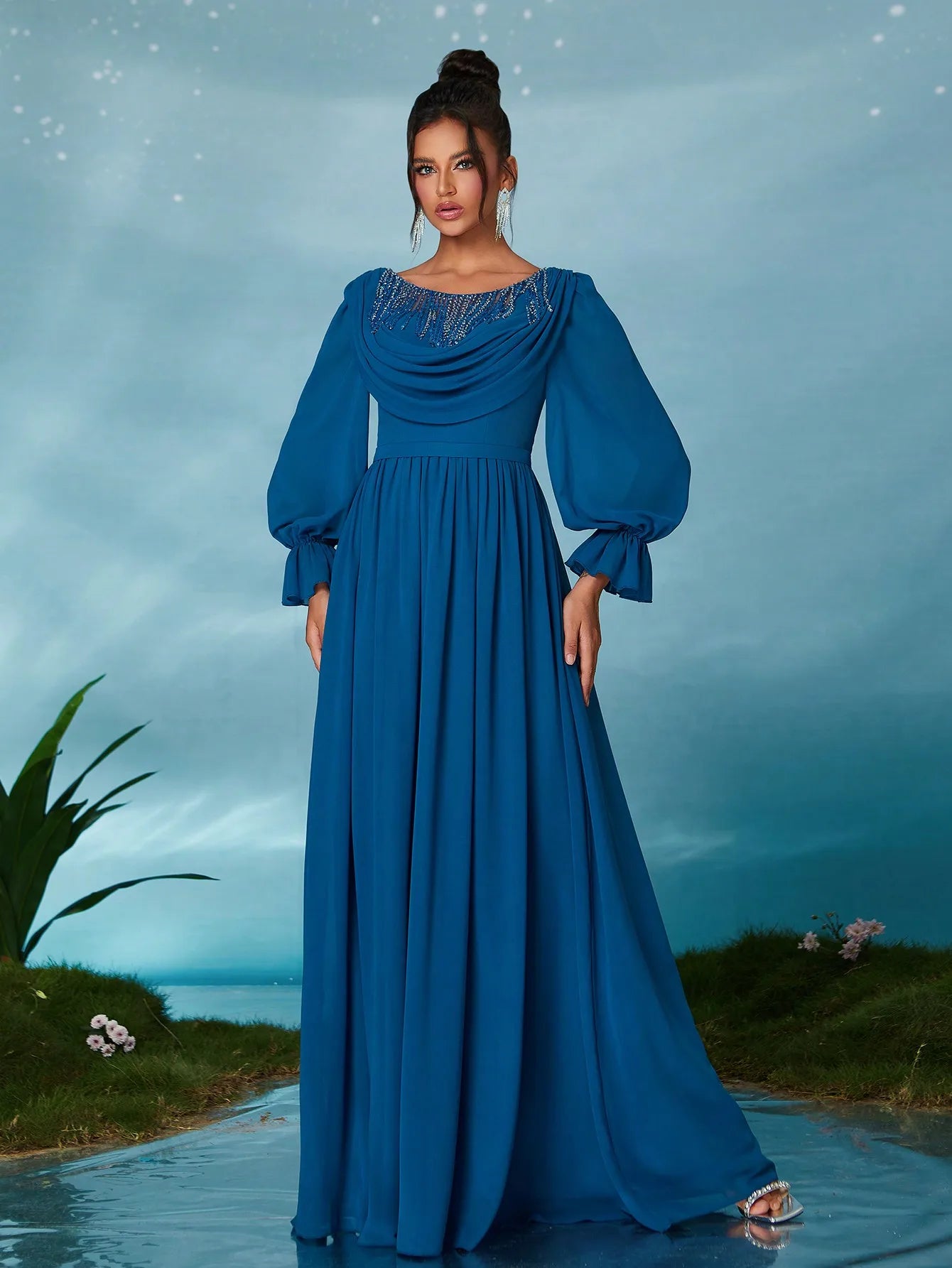 A high-end evening dress with a round neck, beaded flower edges, pearl chiffon, wrapped chest and flowing sleeves
