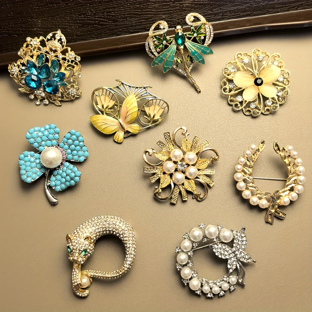 Collection of decorative brooches on a beige surface