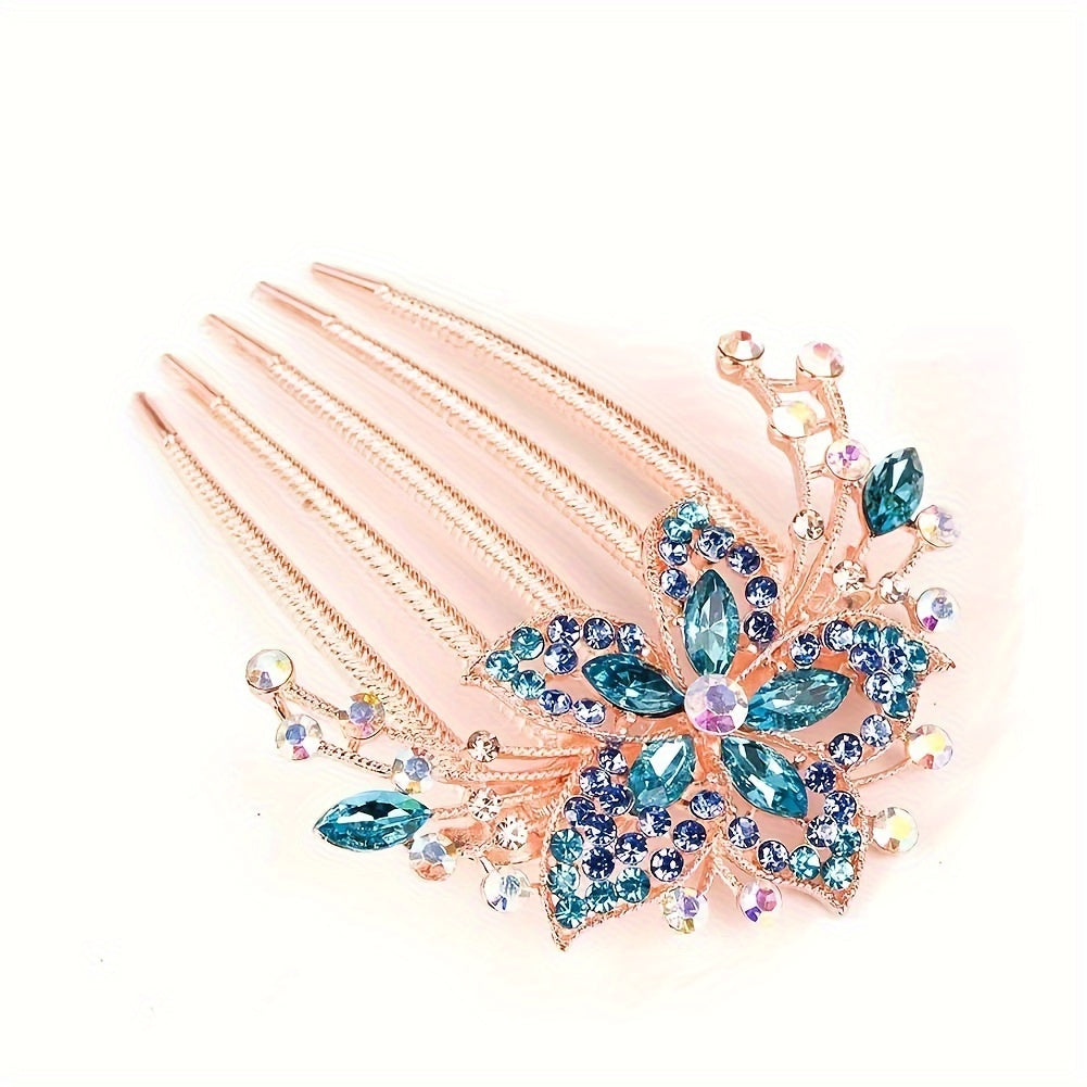 Decorative hair comb with blue gemstones on a white background