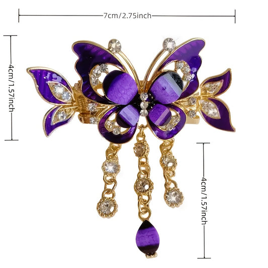 Purple butterfly brooch with gold accents and gemstones, shown with measurements on a white background.
